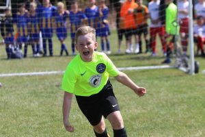 young footballer celebrates
